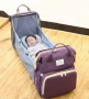 Portable folding crib/ Multi-functional Double Shoulder Baby Bag - purple